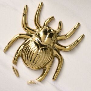 Anthropologie X Catherine Martin midnight creatures brass bottle opener